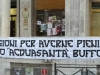 Striscione di protesta appeso davanti al comune dell'Aquila,prima di fare irruzione nell'ufficio del Sindaco. "Abbiamo mille ragioni per averne pieni i coglioni, aprite lo stadio di acquasanta buffoni! " 2 Febbraio 2016